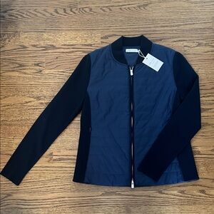 Peter Millar Women's Lightweight Blue Puffer Jacket with knit sleeves